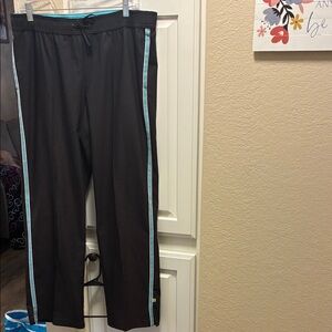 Made for Life Black Track Pants with aqua and white racer stripes down